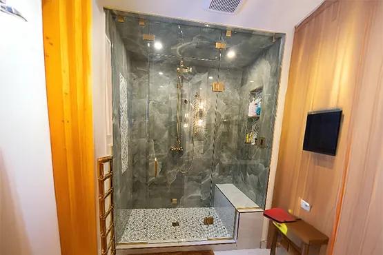 Modern frameless glass shower enclosure installation showcasing professional glass installation craftsmanship