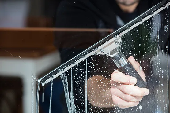 Professional cleaning and maintenance of above ground pool glass panels and surfaces