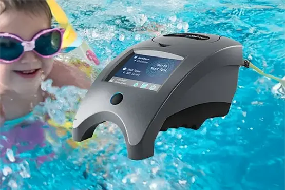 Pool water testing device displayed with child swimming in above ground pool