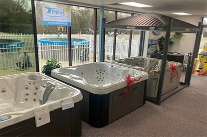 Home Showroom display of hot tubs and spa installation options at Fieldstone Glass, Pool & Spas